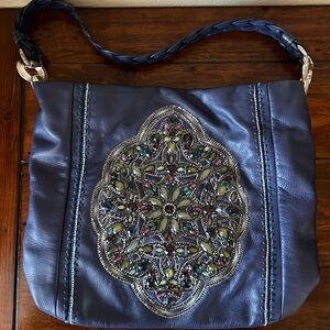 Brighton leather purse with sequin pattern.